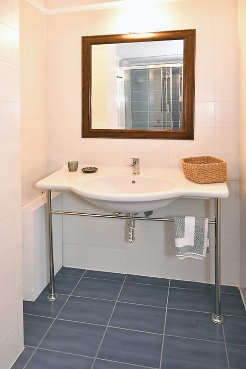 Suite, Balcony | Bathroom | Hair dryer, slippers, towels, soap