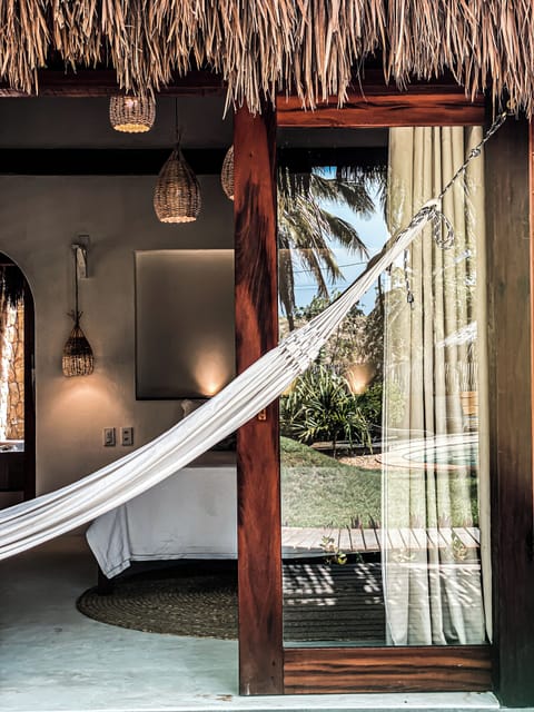 Deluxe Bungalow, Balcony, Pool View | In-room safe, desk, blackout drapes, free WiFi