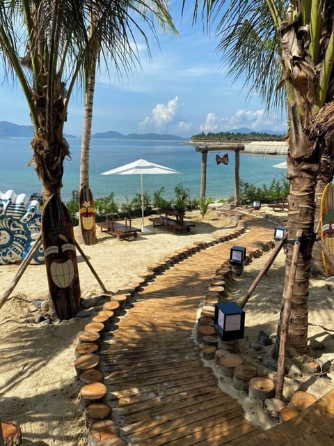 Private beach, white sand, sun loungers, beach umbrellas