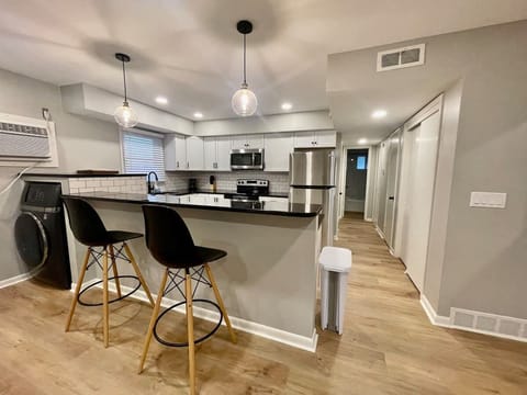 Grab a seat, make a meal, handle laundry. Your efficient space.