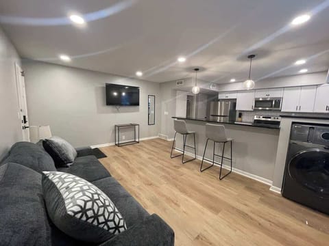 Experience urban ease: cook, lounge, and reset.