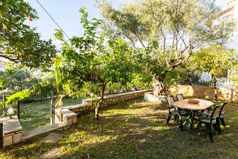 Spacious garden with outdoor dining area
