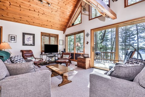 Floor to ceiling windows offer stunning views and ambient lighting.