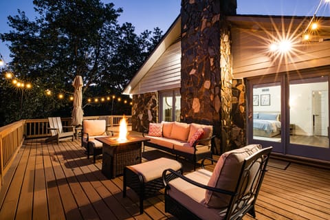 Firepit and string lights enhance your evenings on the deck