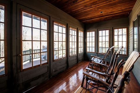 Relax in the seating area with a wide-open view of the mountains through large windows.