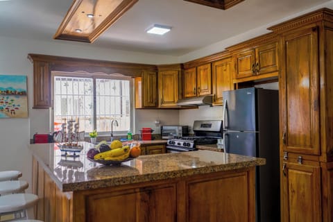 Villa | Private kitchen | Fridge, microwave, oven, stovetop