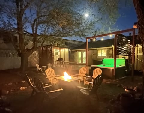 Fire pit is wonderful for enjoying a night time meal from the BBQ