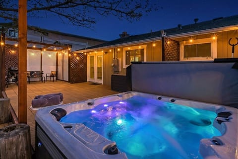 The backyard you pictured when you started searching—the one that makes you stop scrolling. Unwind in the glowing hot tub under the string lights with the BBQ fired up. Your Reno getaway starts here. Book your stay today!