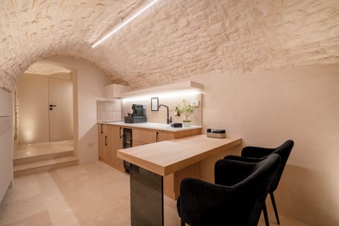 Luxury Suite, 1 King Bed | Private kitchen | Full-size fridge, stovetop, espresso maker, coffee/tea maker