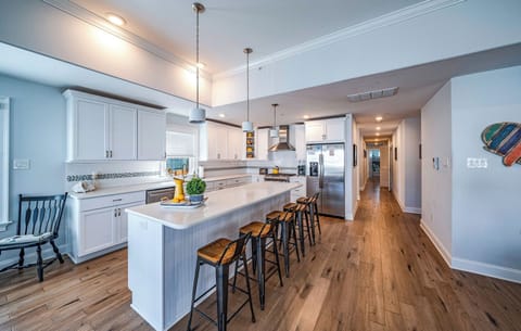 Kitchen island with five bar stools
