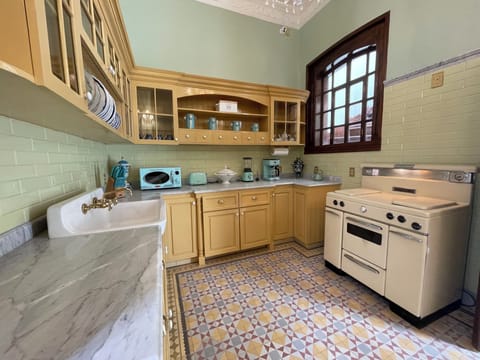 Mini-fridge, microwave, blender, cookware/dishes/utensils