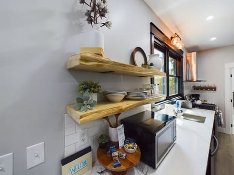 When your kitchen is so organized, even the snacks feel fancy 🍫✨ Welcome to my ‘open shelving = open heart’ zone!