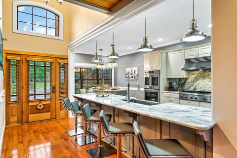 Our kitchen/dining area comfortably seats 14 people.