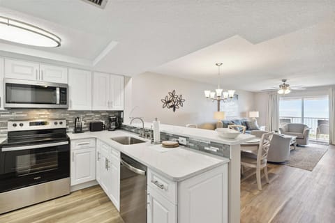 A beautifully designed kitchen with modern appliances and an open layout, perfect for cooking and entertaining.