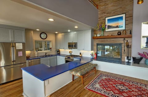 Beachwood Kitchen and Fireplace - Kitchen area and wood burning fireplace.