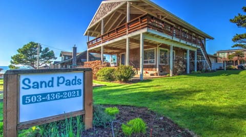 Sand Pads Exterior - Exterior showing second floor deck.