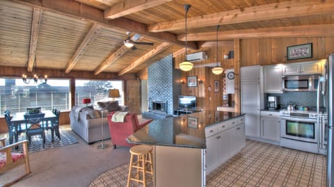 Sand Pads Kitchen Island and Living Area - Kitchen island with living and dining areas.