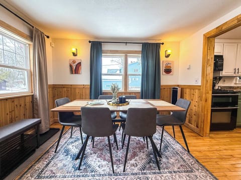 A dining room table is perfect for gathering with your loved ones for a comforting meal.