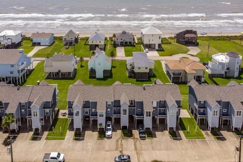 Drone view of townhouses, showing gulf view and easy walk to beach!