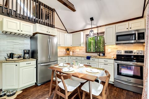 Kitchen with granite countertops and modern appliances
