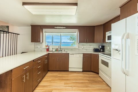 Plenty of room to cook up a storm! This spacious kitchen offers ample counter space and appliances for group meals.