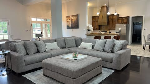 Amazingly comfy sofa with massive ottoman that turns into queen bed!