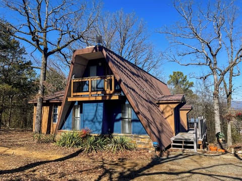 Front and back balconies overlook the vast wooded area and Cavanal Mountain!
