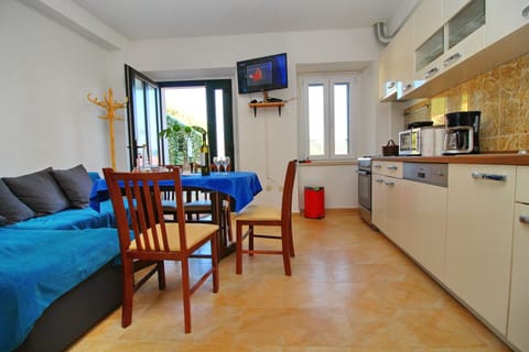 Apartment (Duplex Apartment with Terrace and Sea) | Living room | 32-inch flat-screen TV with cable channels