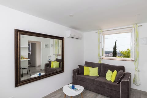 Apartment (One Bedroom Apartment with Terrace an) | Living room | 32-inch flat-screen TV with digital channels