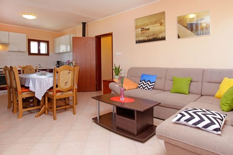 House (Three Bedroom Holiday Home with Terra) | Living room | 32-inch flat-screen TV with cable channels