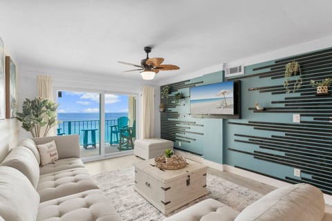Dive into relaxation in the coastal vibes at our open-concept getaway! 🏝️ Feel the stress melt away as you gaze upon the breathtaking gulf view and admire the stunning feature wall that adds a touch of elegance to your retreat. 