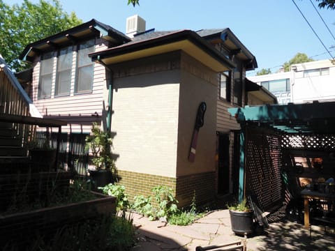 Brick exterior of detached carriage house