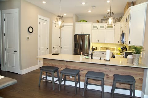 Fully equipped kitchen, coffee maker, Keurig, pots and pans, dishes, silverware