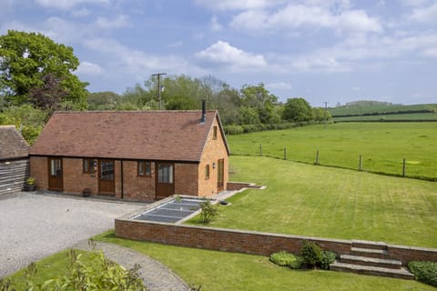 Aerial view of The Stables and the front lawned, shared garden