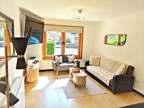 Step into this beautifully designed home featuring cozy and stylish living area