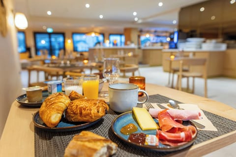 Daily buffet breakfast (EUR 11.90 per person)