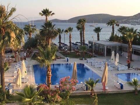 2 outdoor pools, open 9:00 AM to 6:00 PM, pool umbrellas, sun loungers