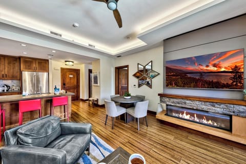 Enjoy movie night on the big screen TV above the gas fireplace