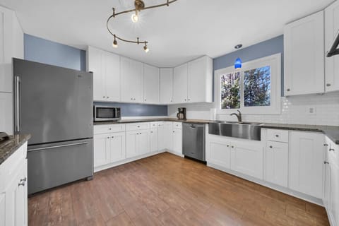Gorgeous stainless steel appliances in this kitchen