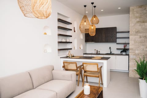 Deluxe Apartment, Sea View | Living area | 42-inch flat-screen TV with digital channels, Netflix