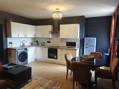 Classic Apartment | Living area | 42-inch Smart TV with digital channels, iPod dock, pay movies