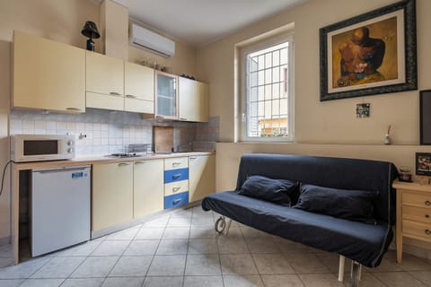 Apartment | Private kitchen | Espresso maker, dining tables