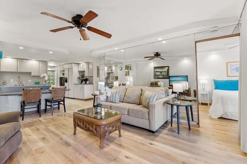 Stunning bright white space with modern Hawaiian decor and furnishings