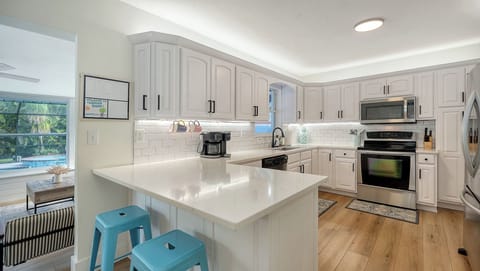 From morning coffee by the pool to sunset cocktails at the tiki bar