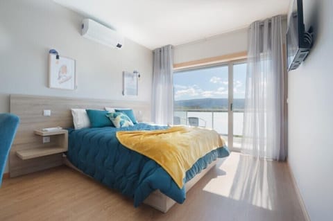 Superior Suite, Pool View | Desk, free WiFi, bed sheets