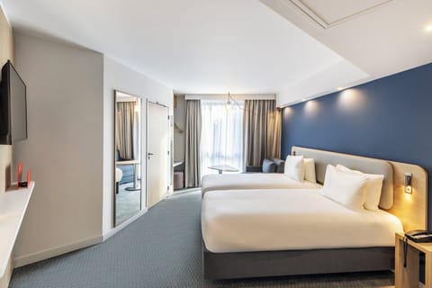 Select Comfort beds, laptop workspace, blackout drapes, soundproofing