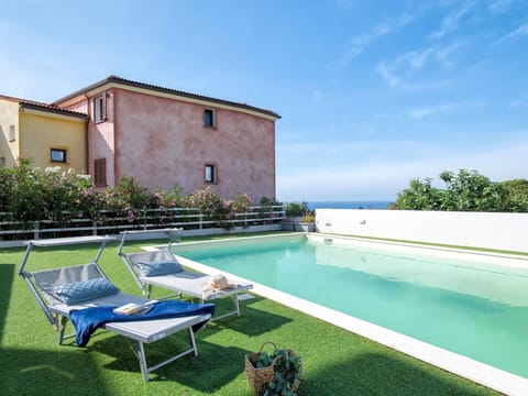 Water, Plant, Property, Swimming Pool, Green, Azure, Outdoor Furniture, Shade, Grass, Leisure