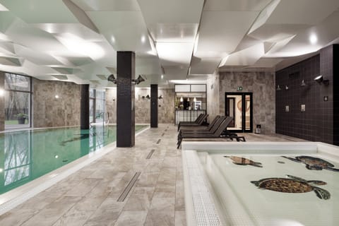 Indoor pool, sun loungers, lifeguards on site