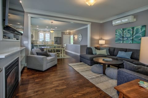 Dining room is next to the living room of the house. 