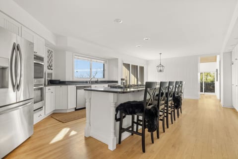 The open design kitchen is inviting. Anyone up for some tasty morning coffee?